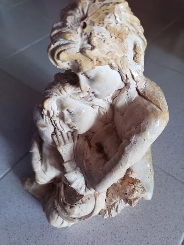 Handmade ceramic female sculpture, mother and daughter theme.